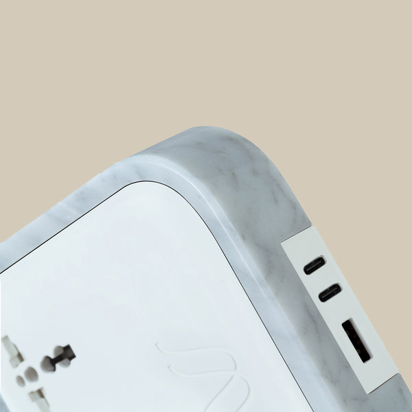 Wireless Charger
Description
Crafted with exclusive Carrara marble, the Woodie Hub charges 6 devices in one with style and elegance. Just place your Qi-compatible smartphoWoodie Hub – Italian Classic